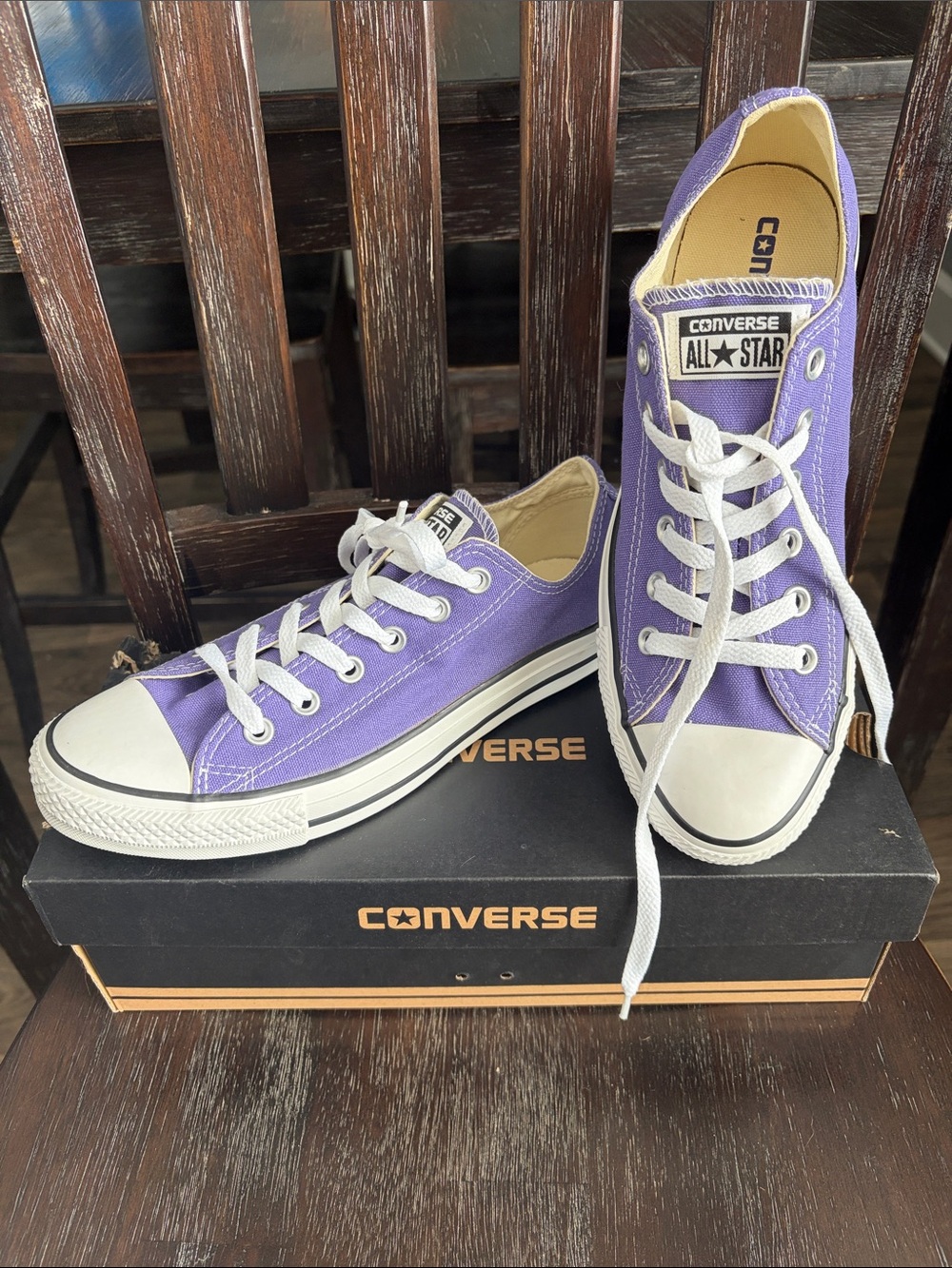 Converse All Stars Low Top Sneakers in Lavender and White